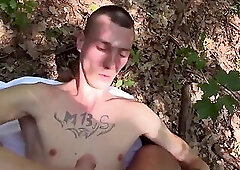 Tatted-up chap pulls down his jeans and bonks outdoors