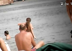 2 outstanding golden-haired teen nudists play around on the beach and showing off their tiny bazookas and constricted booties previous to going in the