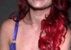 Redhead slut with big boobs goes down