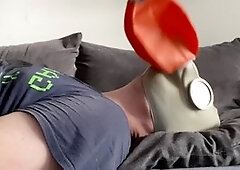 Panting masked slave in intense bondage and breath control