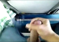 Horny amateur dude keeps jerking his dick right in the public bus