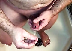 Urethral Sounding my Uncut Penis during the time that Showering. Spunk flow was so Pleasurable