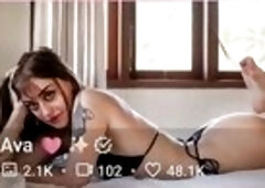Brunette hair chick gets fingered after oily massage