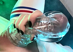 Super-cute femboy plays with a fleshlight