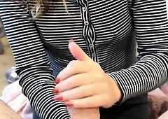 Sensuous babe with small tits provides handjob service