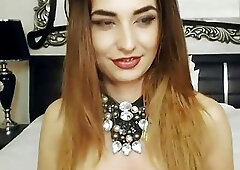 Classy blonde shemale spreads her legs and strokes her schlong