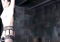 Flogged sub restrained over a sybian for brutal cunt torture