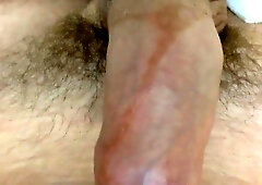 taut uncircumcised foreskin spread out and rubdown