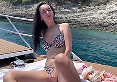 Big-Titted Brunette Vibes to Orgasm on a Yacht