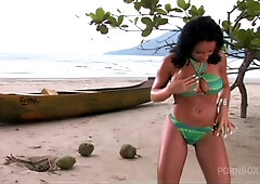 Girl fucks hard with her boyfriend on the beach in a doggy pose