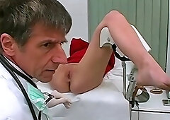 This blonde woman is at the doctor sucking dick