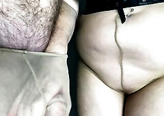 Mrs Older Feet wearing enjoyable sheer tan tights and her waspie which makes her bazookas look even more excellent, is playing with her nylon loving a