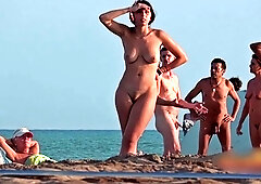Nudist beach voyeur captures lovely amateur babes sunbathing