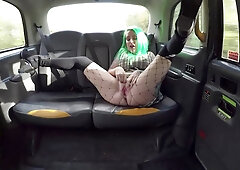 Green-haired bitch Phoenix Medina gets banged in the taxi