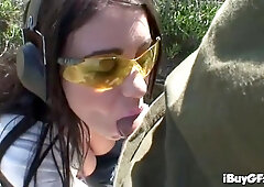 Whitney Stevens armed and outdoors