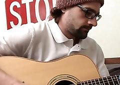 Straight man plays the guitar before playing with his cock