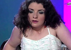 Bulgarian model Diana Kolentsova performs a sensual striptease on a red carpet
