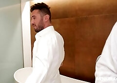 Gay businessman in suit gets pounded by a massive cock behind the scenes