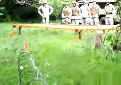 Trooper giving head and licking asses outdoors