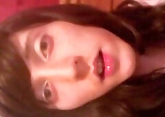 Teenage shemale sucks a toy like it's a real dick