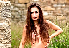 Beautiful small-tit hottie Edessa G. shows off her naked body outdoors