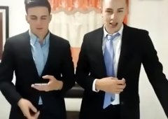 Couple of well dressed cam sluts put on a show