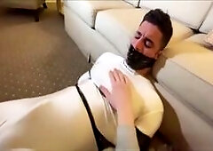 Bound guy wears Spidey costume tight