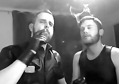Two Muscular Guys Smoking And Kissing