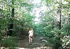 chubby girl with big booty walking nude in forest