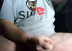 Chubby Guy in the Back Seat Jerking-off and Cumming While Watching Porn