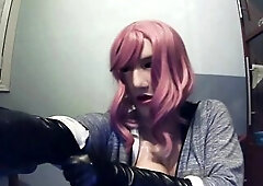 Masked in Anine female mask with pink wig and putting on ebony leather gloves!