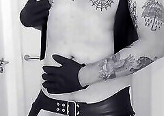 Leatherstudx in very tight leatherchaps, tattooed, pierced and big fat cock!