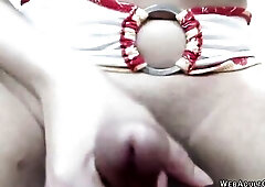 Breasty brunette hair amateur Oriental trans TransNextDoor solo kneeling in couch and stroking large dick untill getting climax and cumming closeup in