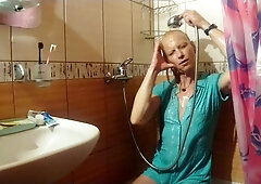 Alexa Cosmic wetlook in shower in teal combidress...