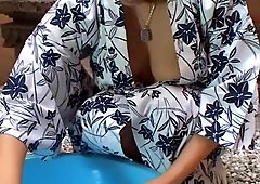 Booty Asian babe shows naked tits on a