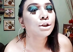 Classy shemale with small tits strips and strokes her rod