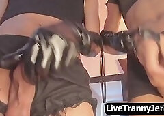 two sexy tgirls stroking their huge cocks in sync