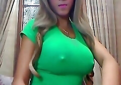 Busty shemale spreads legs to stroke her schlong on webcams