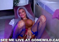 Tattooed Babe in Fishnets Teases