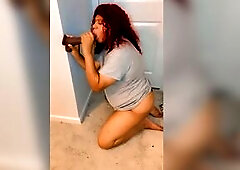 On my knees sucking a bbc sex-toy