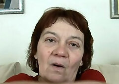 Redhead granny with hirsute snatch and saggy melons