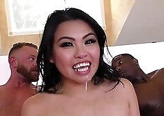 Asian babe riding black schlong