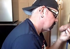 Mature gay dude gives a blowjob through a gloryhole in a homemade video
