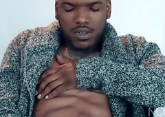 Black hottie Aaron Reese masturbates in an armchair