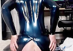 503.4 riding a big cock in latex suit
