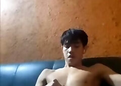 Asian guy jerks off