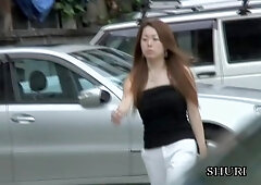 Fanciful oriental sweetie loses her sexy skirt when someone grabs it