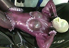 Rubber fetish scene with kinky teen girl