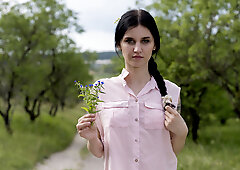 A fit model with natural boobs masturbating outside