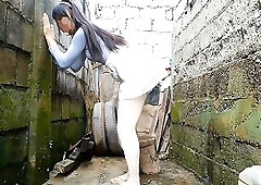 Peeing from behind onto the wall after watching parade